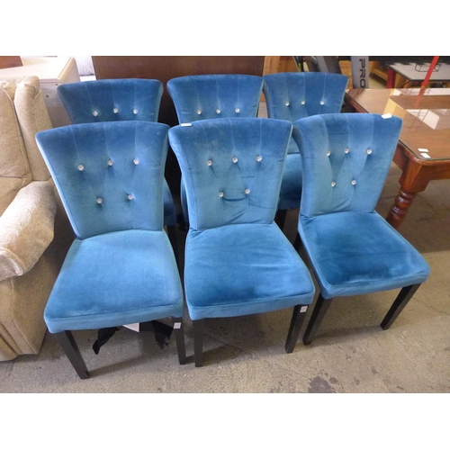 1688 - A set of six blue velvet dining chairs