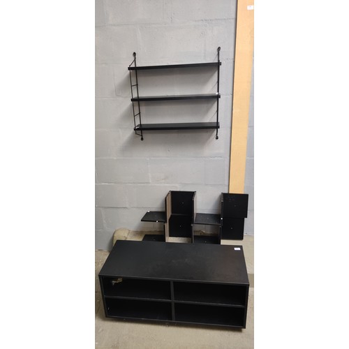 1677 - Three black wall shelves and a TV unit