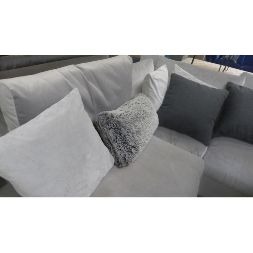 1483 - A grey velvet upholstered corner sofa (some marks)