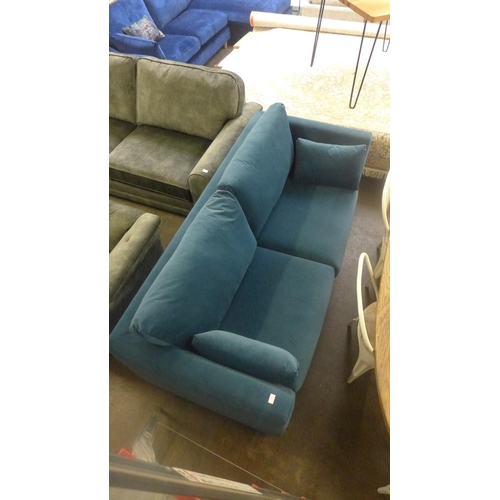 1521 - An Alice blue velvet three seater sofa