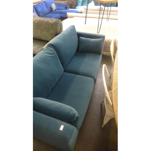 1521 - An Alice blue velvet three seater sofa