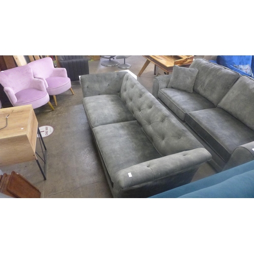 1522 - A crocodile green button back four seater sofa