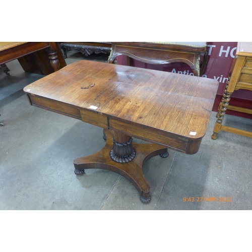 28 - A Regency rosewood two drawer library table