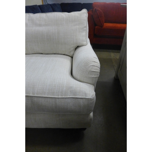 1370 - An oatmeal upholstered love seat