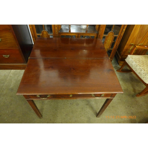 205 - A George II mahogany single drawer fold over tea table