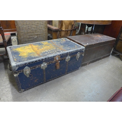 246 - Two vintage steamer trunks and a desk