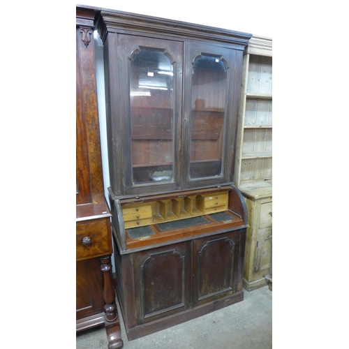 259 - A Victorian mahogany cylinder secretaire bookcase