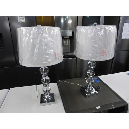 1471 - A pair of glass and chrome table lamps