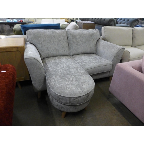 1529 - A pewter velvet two seater sofa with leg rest option