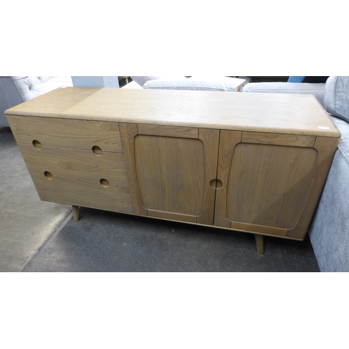 1534A - A mid century style oak large sideboard