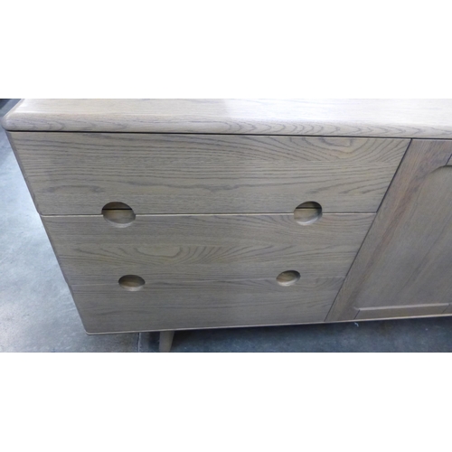 1534A - A mid century style oak large sideboard