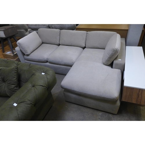 1544 - A light stone RHF corner sofa