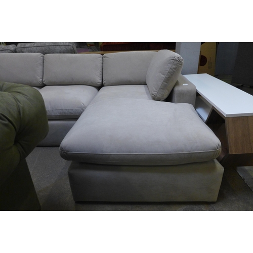 1544 - A light stone RHF corner sofa