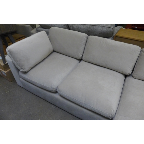 1544 - A light stone RHF corner sofa