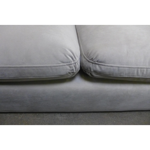 1544 - A light stone RHF corner sofa