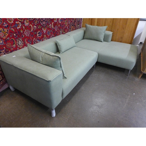 1557 - A pistachio upholstered RHF corner sofa