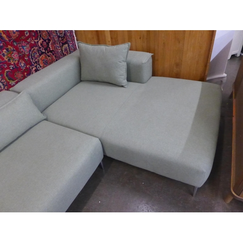 1557 - A pistachio upholstered RHF corner sofa