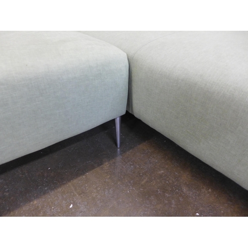 1557 - A pistachio upholstered RHF corner sofa