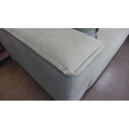 1557 - A pistachio upholstered RHF corner sofa