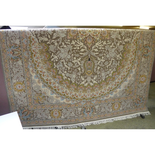 1573 - A large very fine woven truffle Persian carpet, floral pattern and central medallion 400 x 300cm