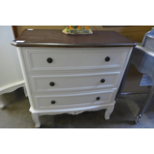 1614 - A three drawer chest with contrasting top