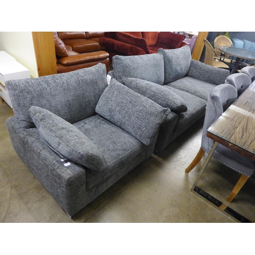 1395 - A grey flecked three seater sofa and armchair