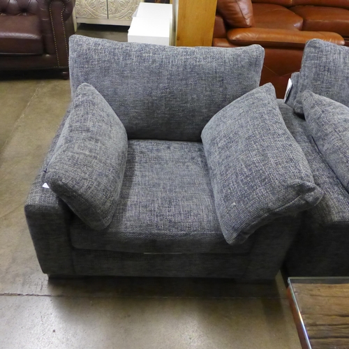 1395 - A grey flecked three seater sofa and armchair