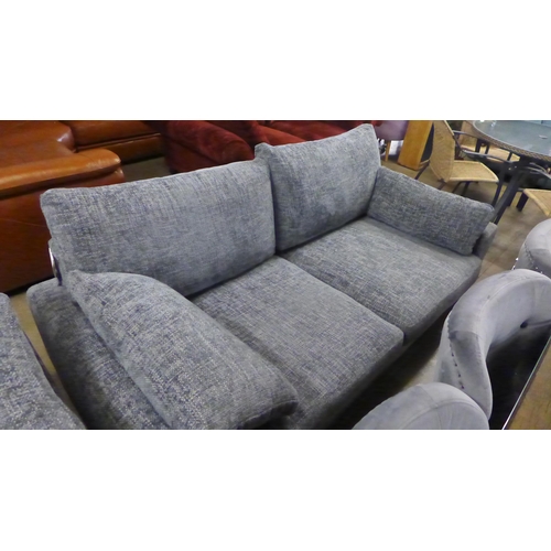 1395 - A grey flecked three seater sofa and armchair