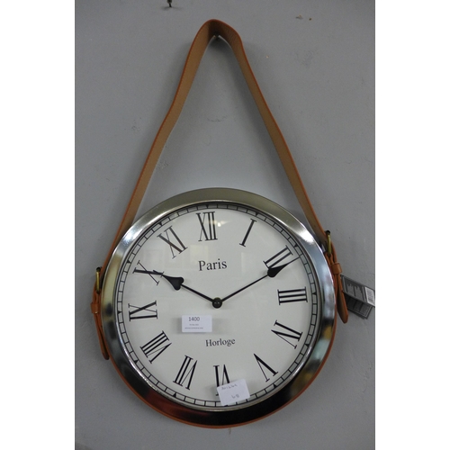 1400 - A Paris wall clock with belt strap hanger, H 57cms x 33cms (CL184112)   #