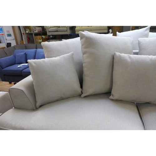 1533 - A Chatsworth-flex straw silver upholstered three and four seater sofas