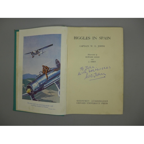 618 - A Biggles in Spain book, signed by Captain W.E. Johns