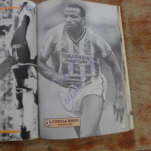 666 - A 1988 Topical Times football book containing autographs of former footballers including Cyril Regis... 