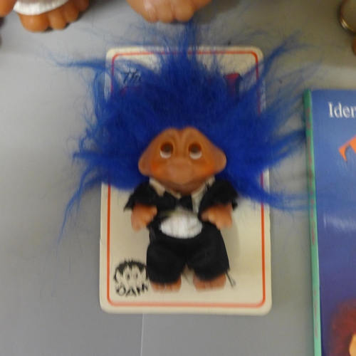 681 - Ten mostly Thomas Dam of Denmark Trolls with Troll identification guide book