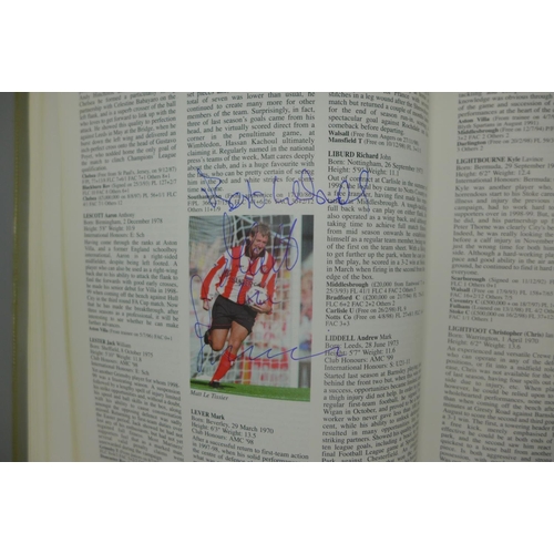 687 - A 1999-2000 PFA Footballers Factfile containing approximately 145 signatures including Duncan Fergus... 