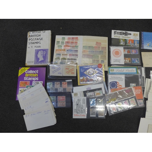 693 - Stamps; a box of GB stamps, covers, presentation packs, booklets, etc.