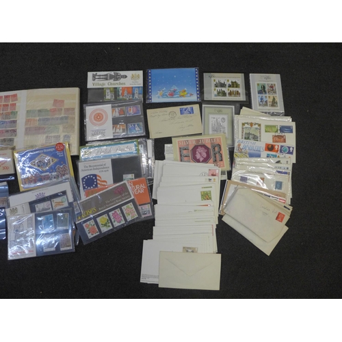 693 - Stamps; a box of GB stamps, covers, presentation packs, booklets, etc.