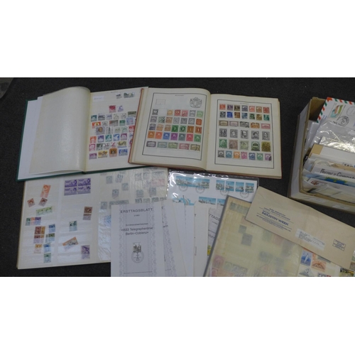 708 - Stamps; a box of stamps in album and three stock books, together with covers, miniature sheets, etc.