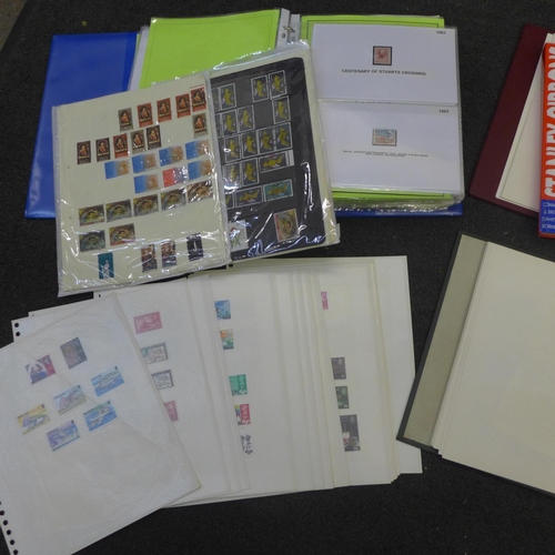 721 - Stamps; a box of stamp albums and catalogue