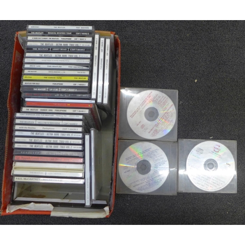 723 - The Beatles CD collection of thirty-four including White Album, Sgt. Pepper, Acetates, etc.