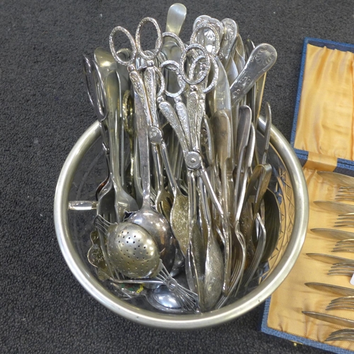 729 - Stainless steel and silver plated cutlery including a plated fruit set, cased