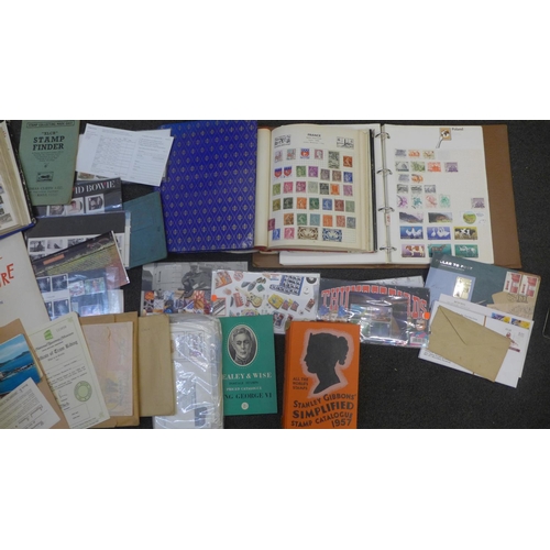 731 - A collection of stamps albums and catalogues