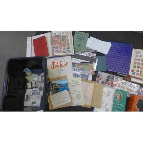 731 - A collection of stamps albums and catalogues