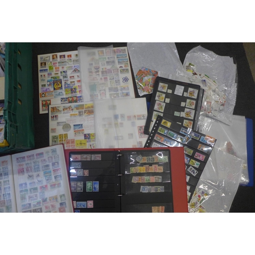 740 - A box of mixed world stamps, loose and in many packets, many 1000's, folder with fifteen sleeves of ... 