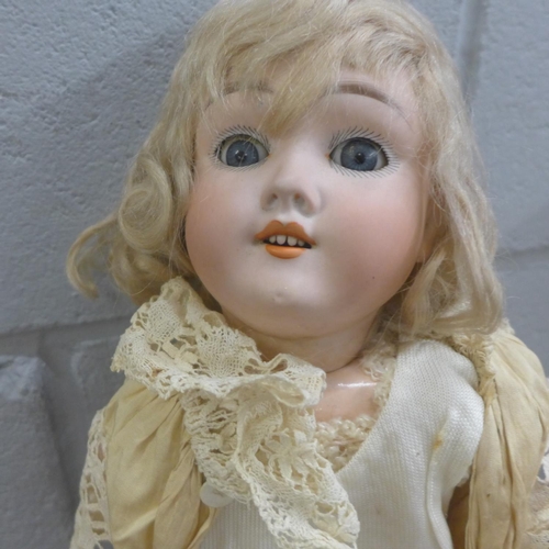 823 - An early 20th Century Handwerck Germany bisque head doll with sleep eyes