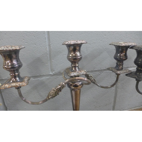 825 - A pair of Sheffield plate on copper candelabra