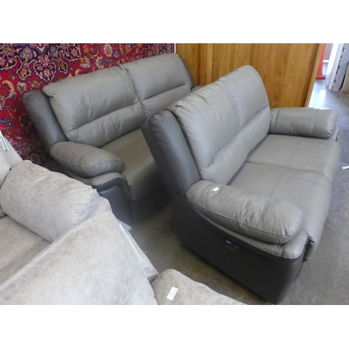 1568 - A Pluto leather three seater and two seater power reclining sofas