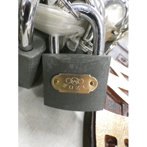 2049 - Approx 12 padlocks with keys unused * this lot is subject to VAT