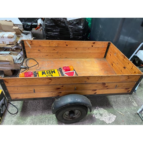 2451 - Approx. 6ft x 4ft trailer with board & electrics, drop back in varnished wood plus spare wheel