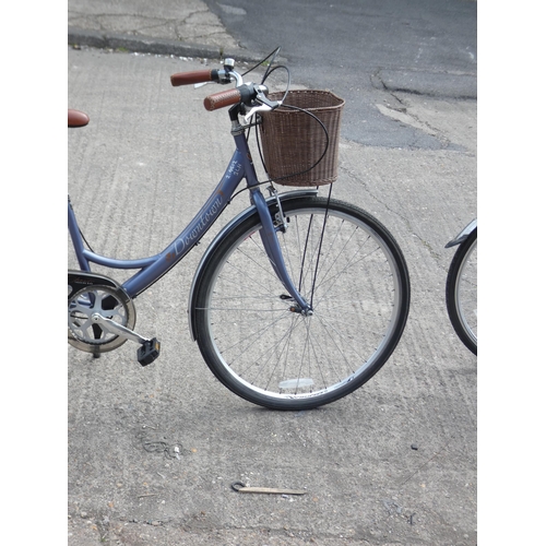 2146 - Downtown lady's sit up and beg shopper bike complete with mudguard rack, basket and chain guard, use... 