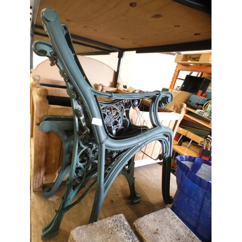 2151 - Two pairs of cast metal bench ends and a pair of table ends